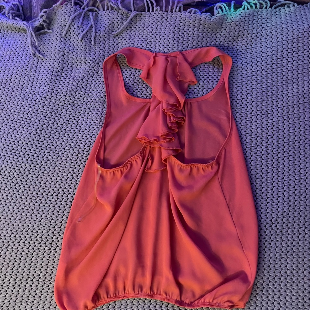 This tank top with ruffles going down the back